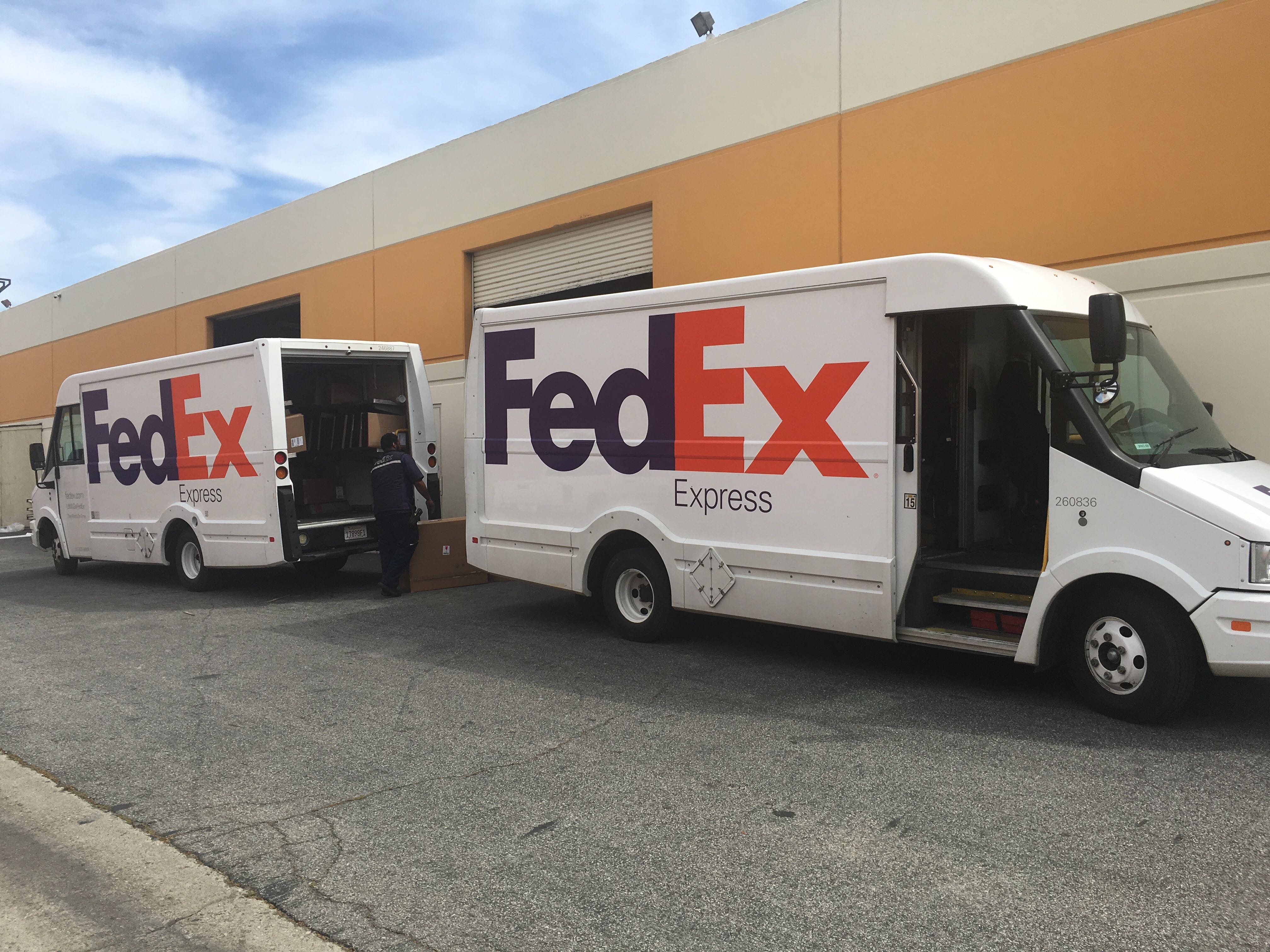 Fedex Trucks waiting for packages
